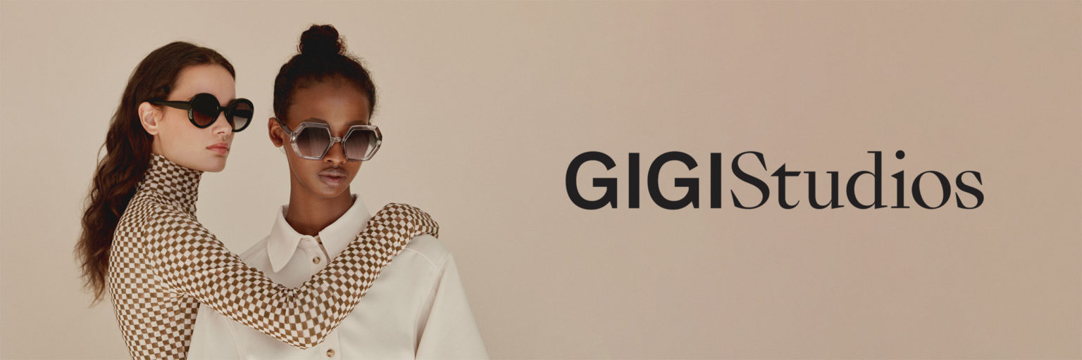 deux femmes portant des lunettes de soleil GIGI Studios modèle STELLE ET SIMONETTA en acétate gris et noir